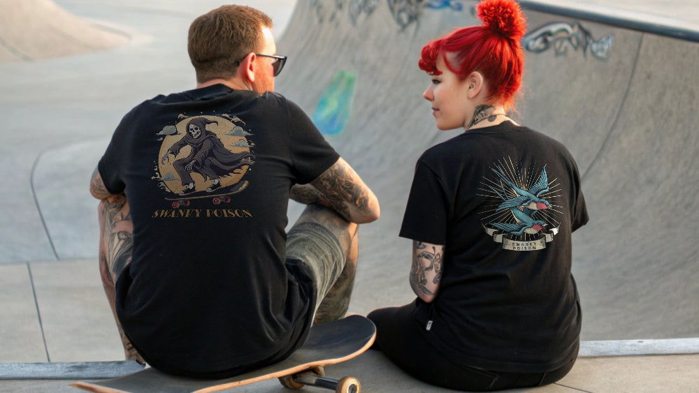 Alternative man and woman in a skatepark wearing black t-shirts with swanky poison designs on them